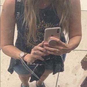 Peloton ohm rare tank top . Soft and cute size medium tiny hole on that back